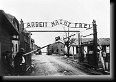 Auschwitz I. The gate with the inscription Arbeit Macht Frei.Photograph by Stanislaw Luczko, 1945. * 760 x 530 * (43KB)